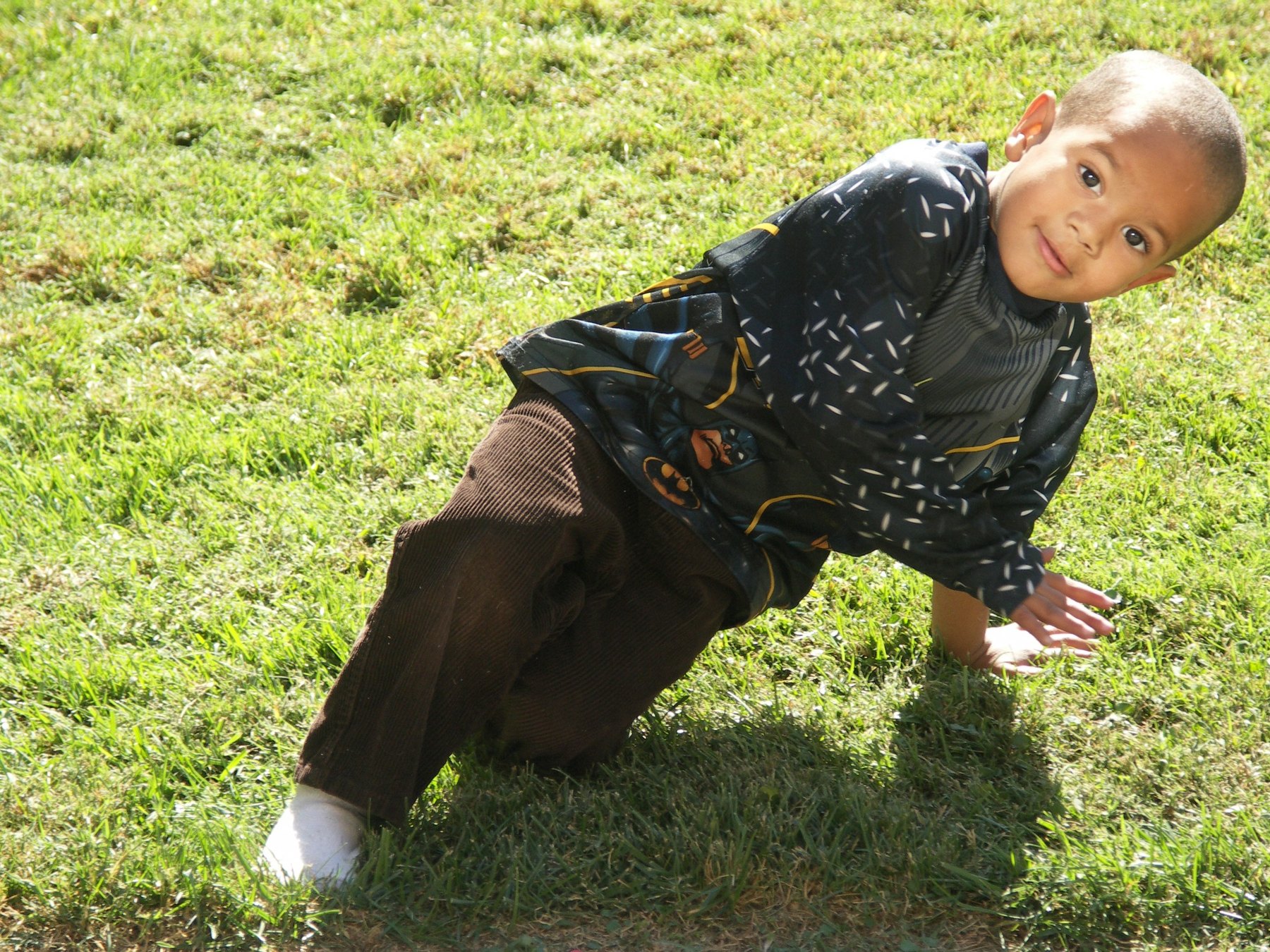 A young child enjoying an outdoor church activity