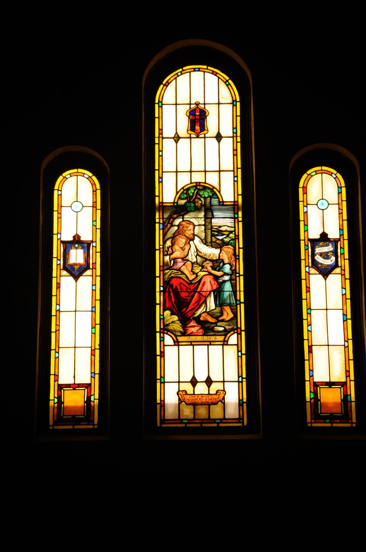 The sanctuary windows are part of the visual story of the church.