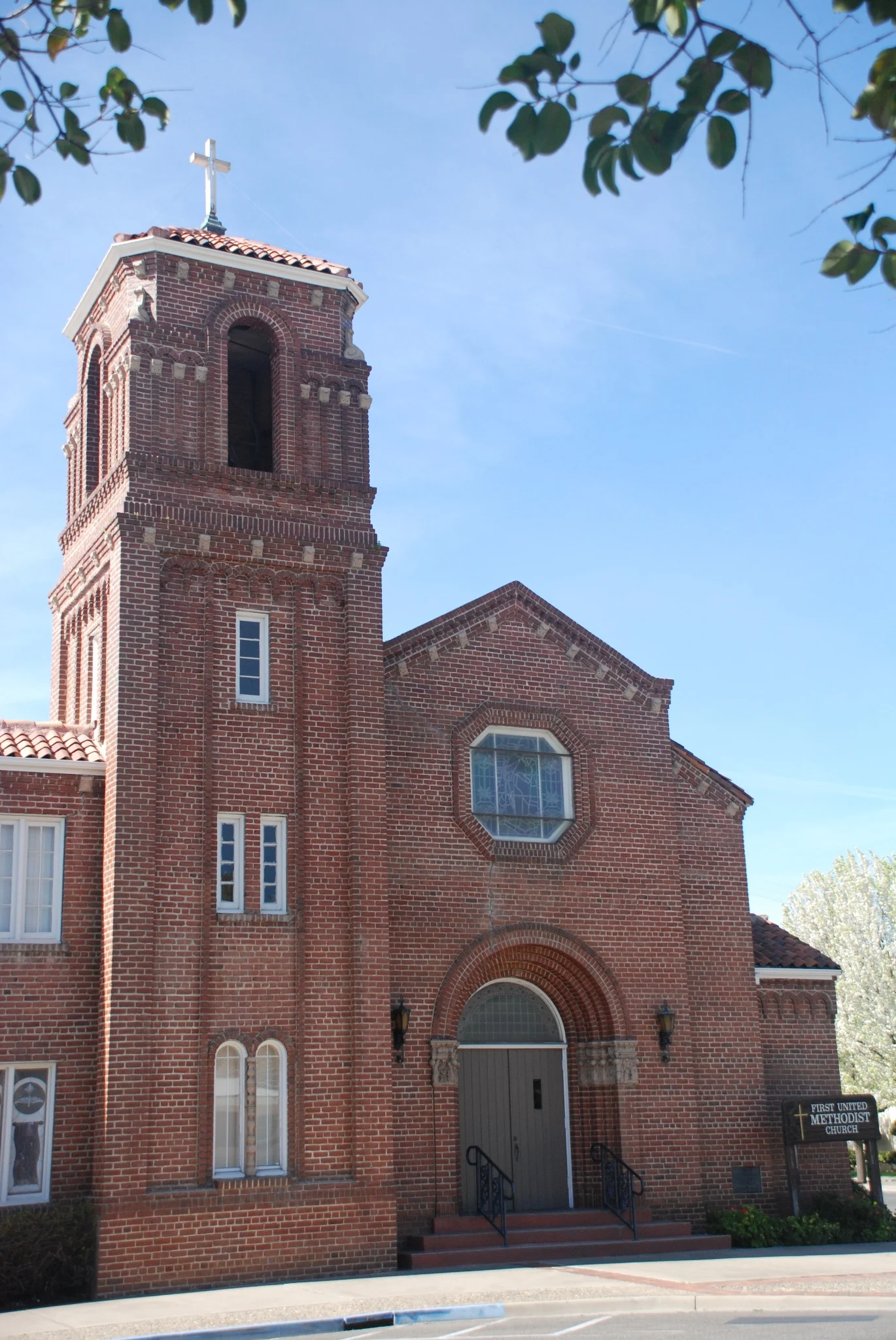 Vertical architectural view of the church tower and main entrance in 2007