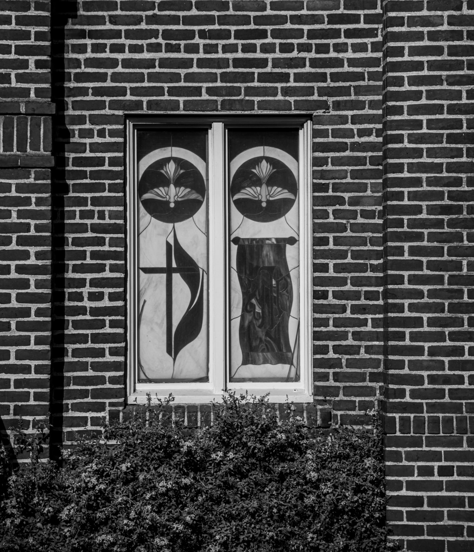 Exterior view of a decorative United Methodist window at Marysville First United Methodist Church in 2026