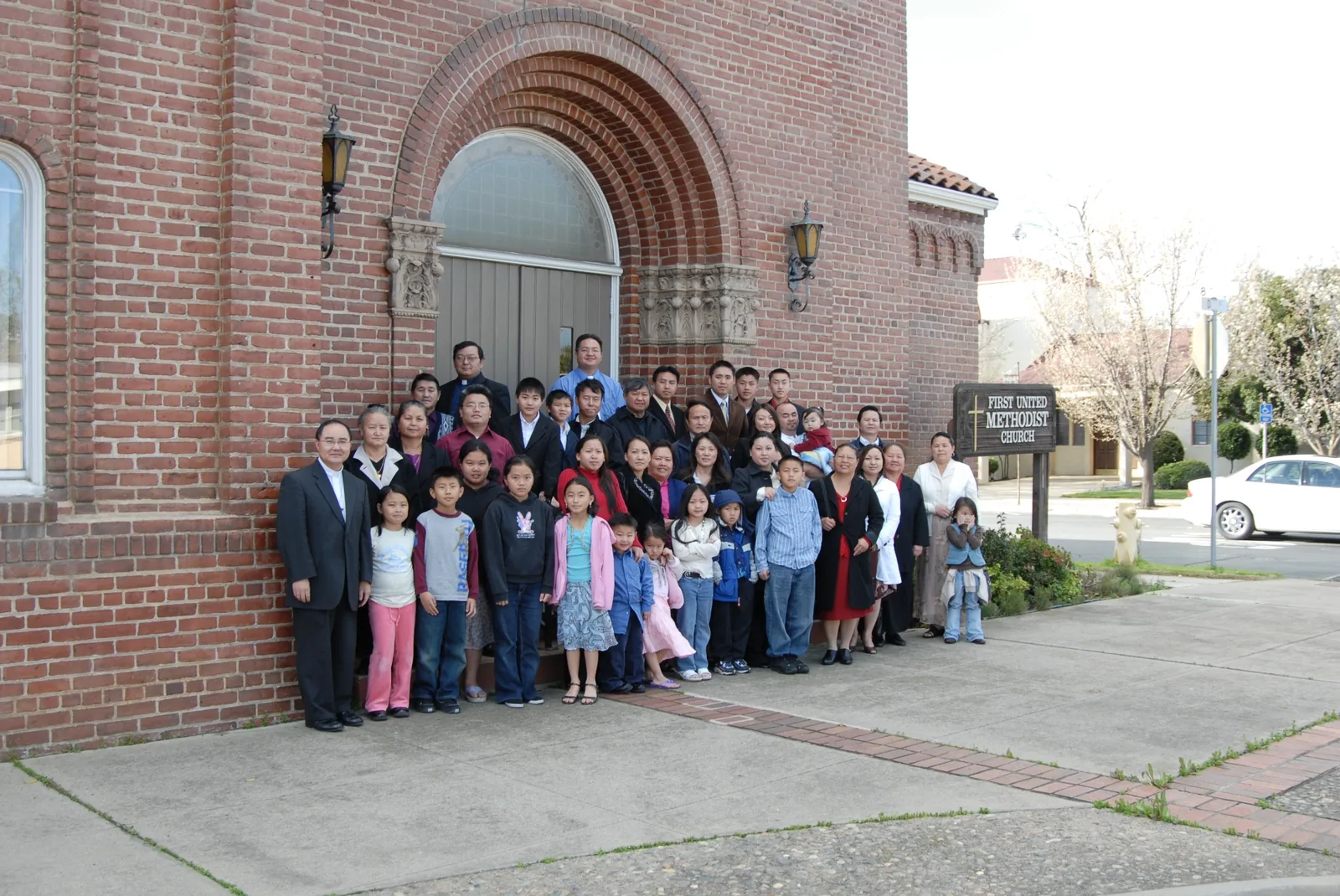Hmong church community gathered outside Marysville First United Methodist Church