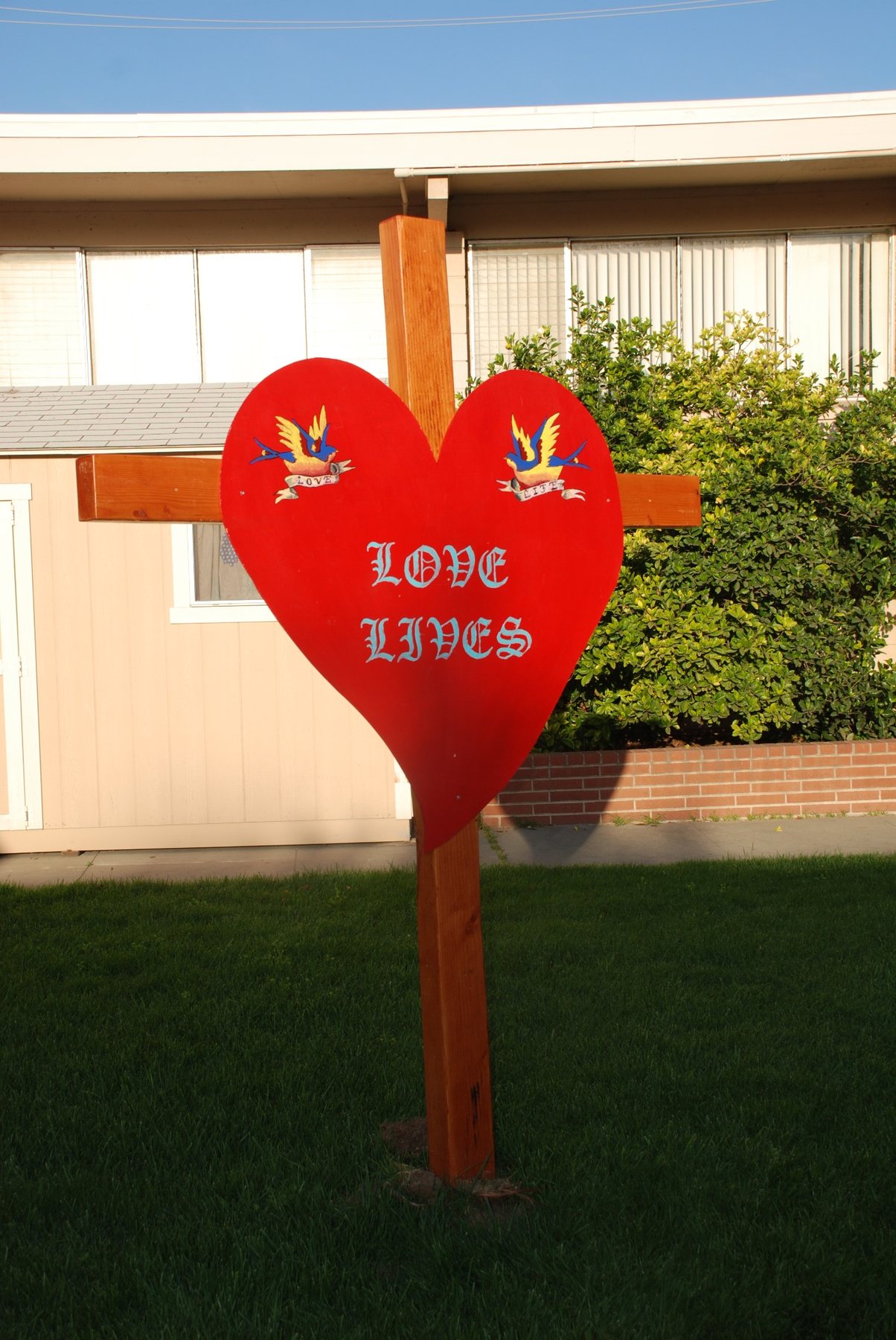 An Easter message outside the church: Love Lives.