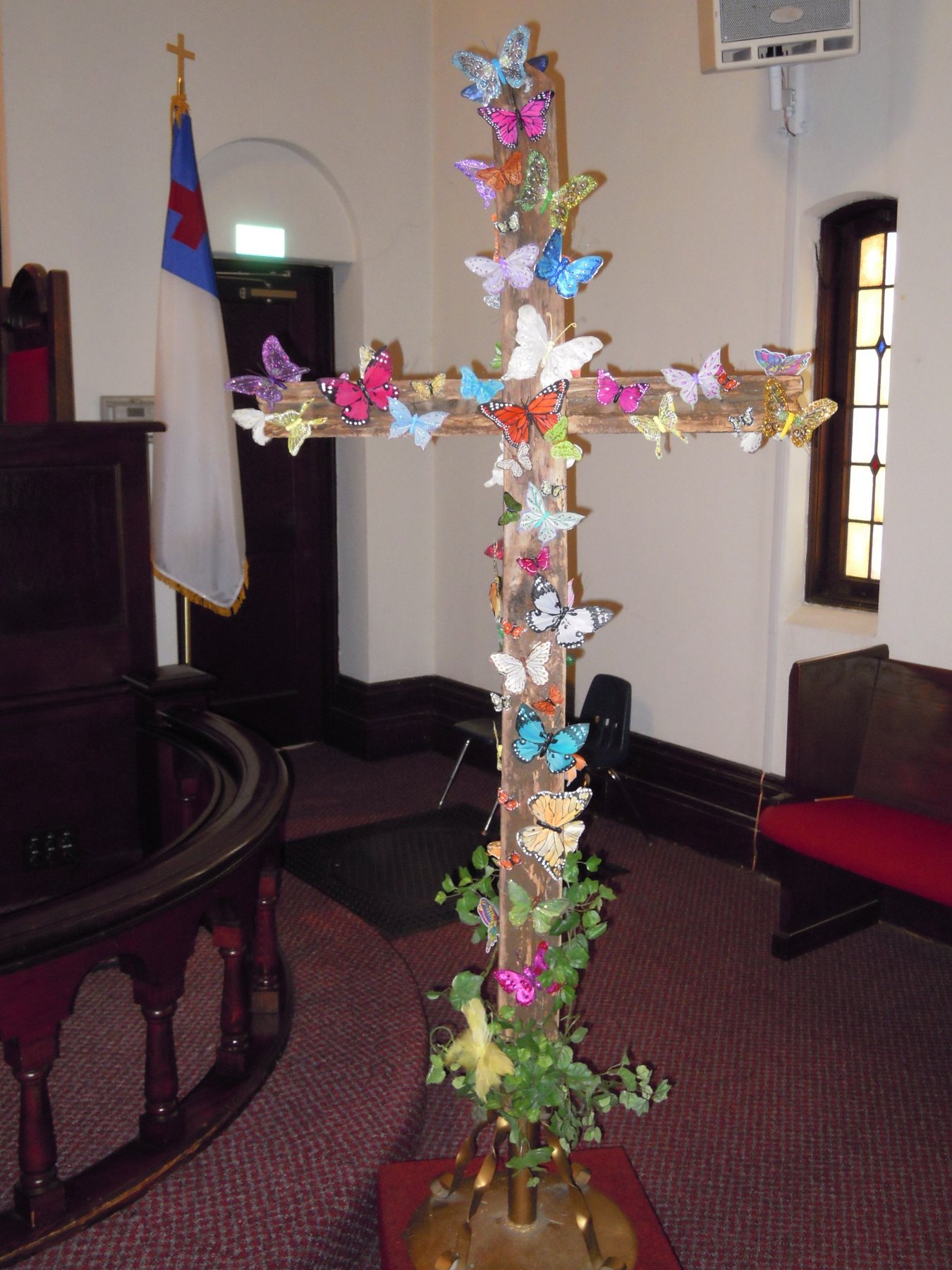 Butterflies and flowers celebrate new life.