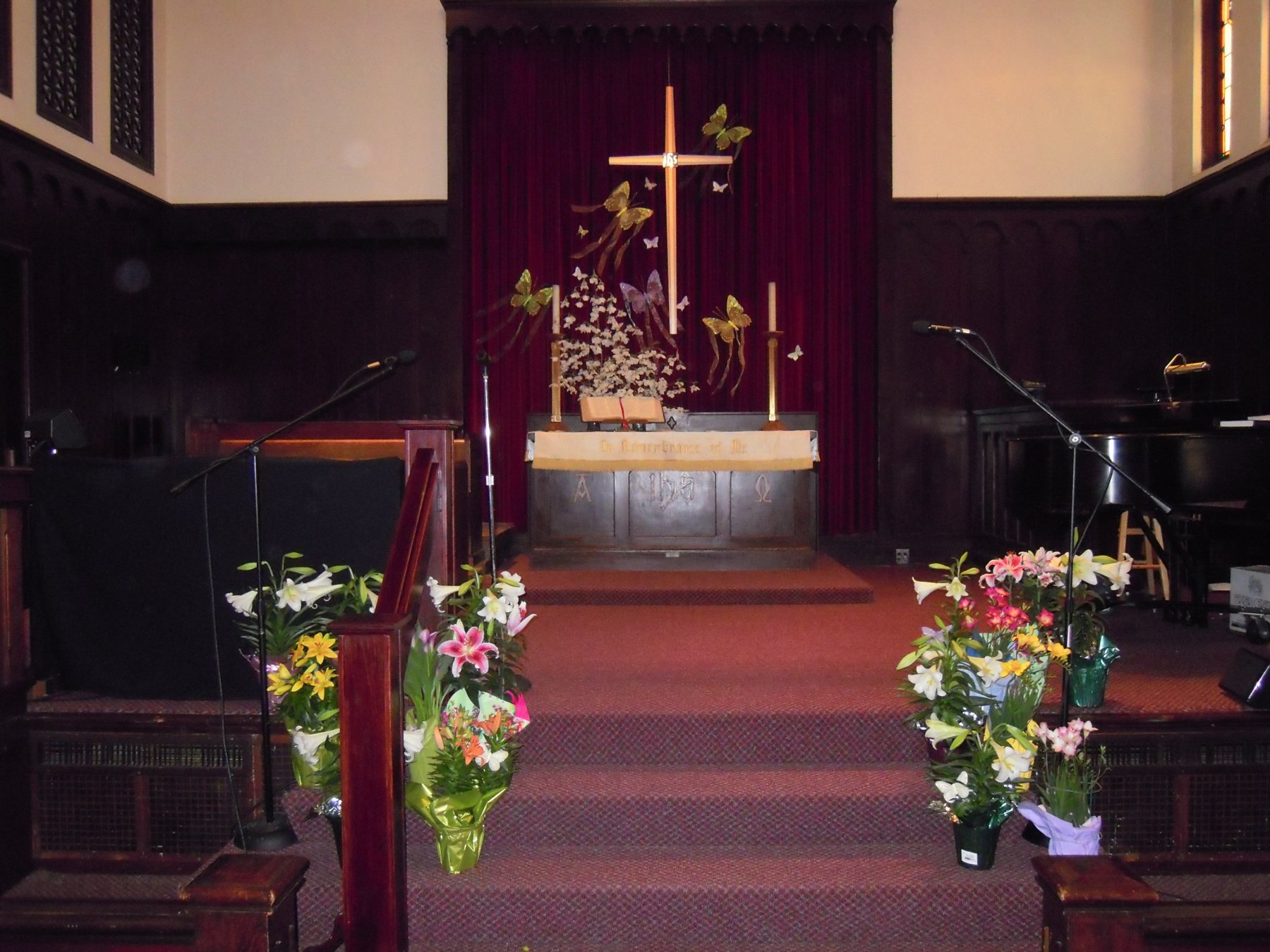 The sanctuary filled with Easter flowers.