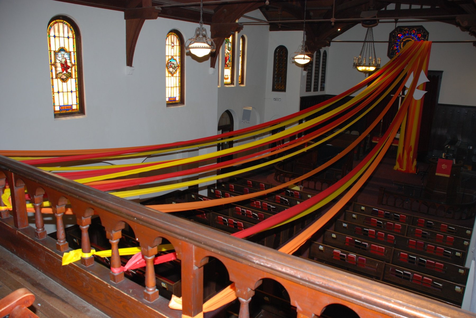 A wide view of the sanctuary transformed for Pentecost.